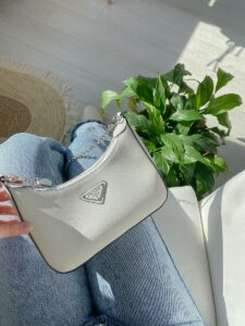 White Bag on Person's Lap
