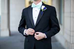 Man Wearing Black and Teal Tuxedo