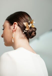 Sleek Low Bun Hairstyle with Hair Accessories 