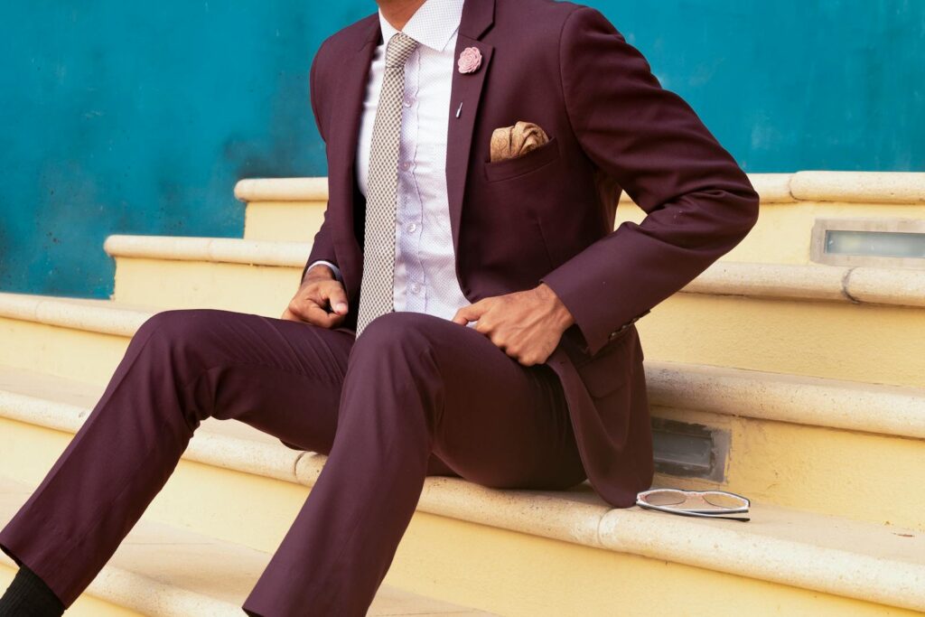 Man in a burgundy suit, two piece suit vs three piece suit