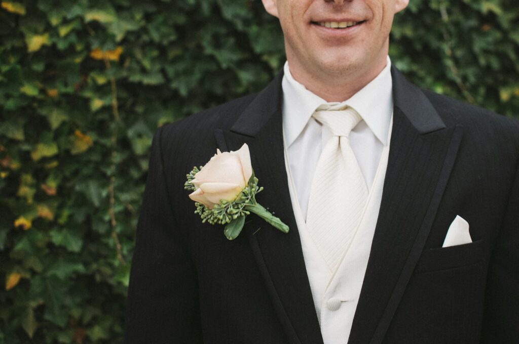 when to wear a tuxedo, man wearing black suit jacket